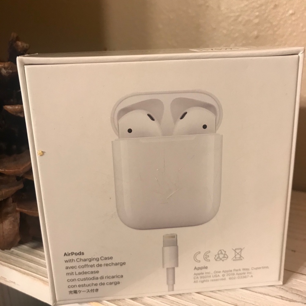 Apple AirPods with charging case.
